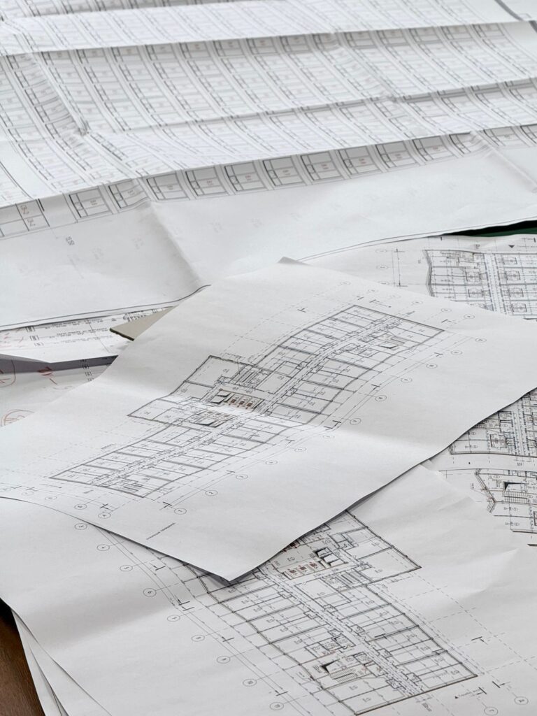 Architectural plans laid out for a Las Vegas pool building permit review
